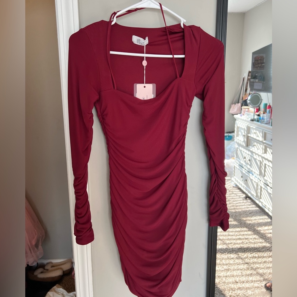 Wine Red Oh Polly bodycon dress. Size 4 beautiful dress. Never Worn, tags on